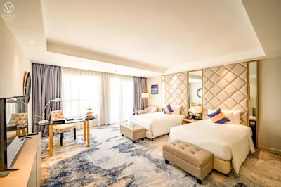 La Vela Luxury Deluxe Zweibettzimmer in höherem Stockwerk — La Vela Saigon Hotel